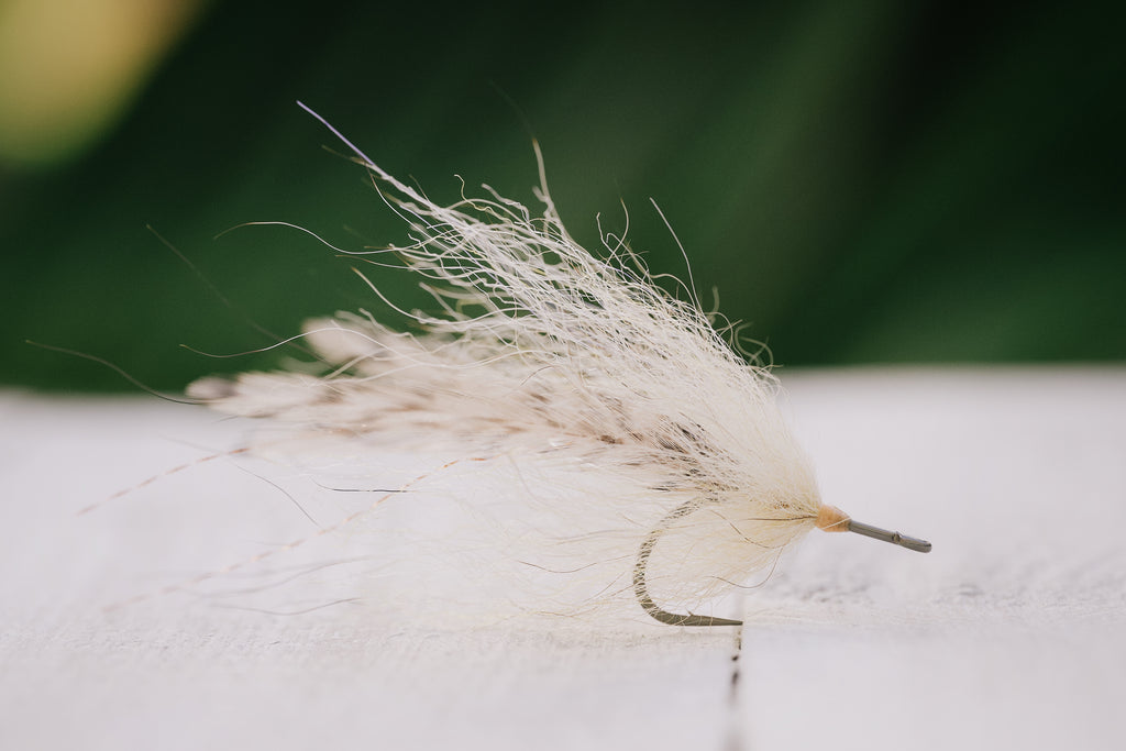 the Foxy Bug tarpon fly in tan colorway tied by Josh Idol of Two Aught Fly Fishing Co
