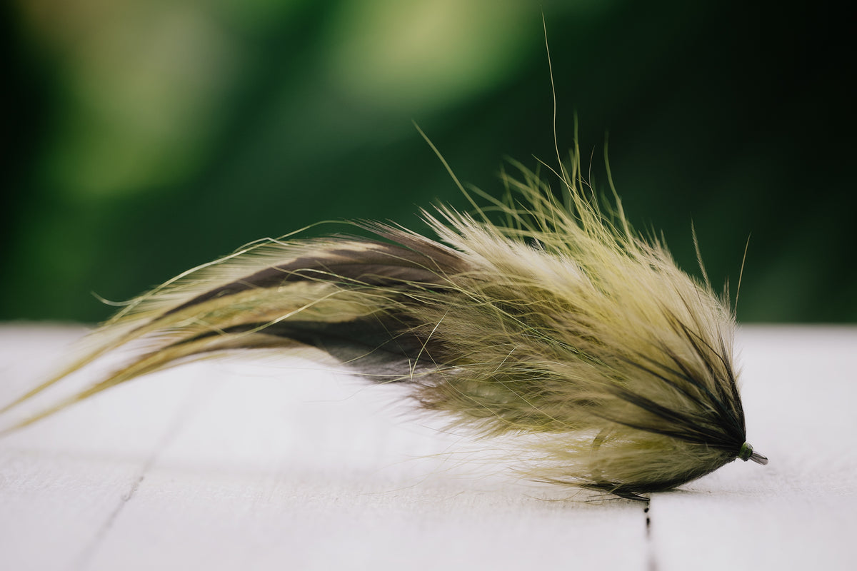 the Glades Fleye tarpon fly in olive colorway tied by Josh Idol of Two Aught Fly Fishing Co