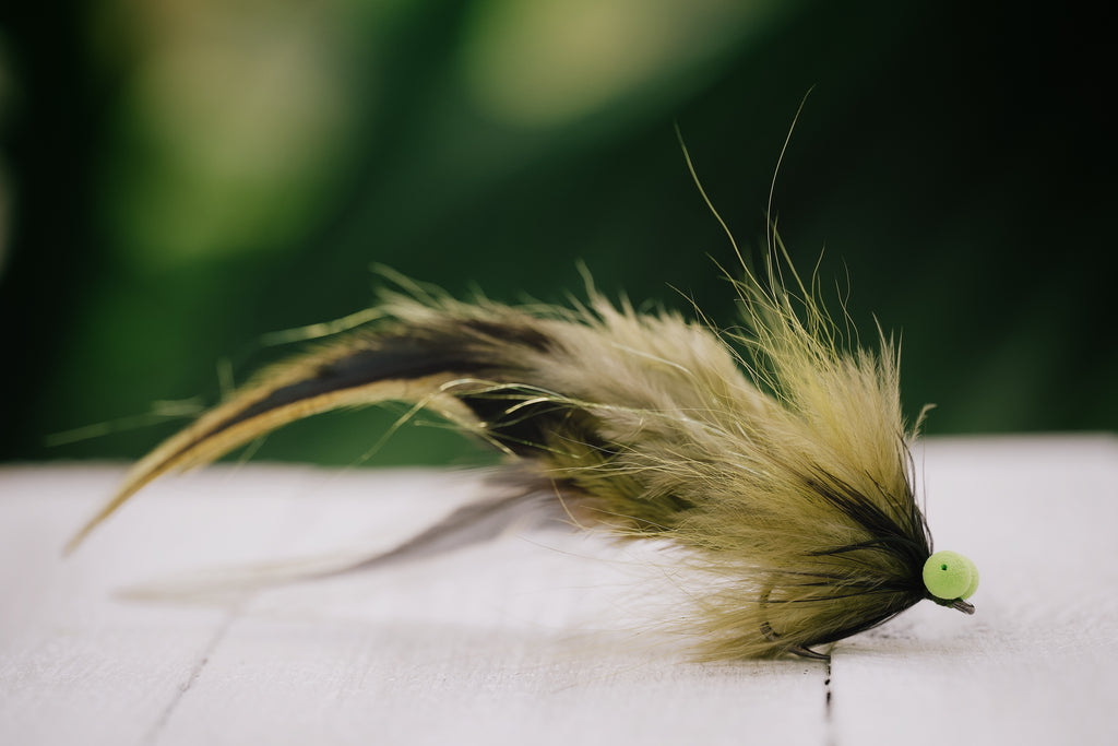 the Glades Fleye tarpon fly tied in olive colorway with foam eyes by Josh Idol of Two Aught Fly Fishing Co