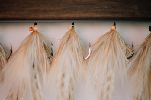 a group of Keys Classics tarpon flies tied by Josh Idol of Two Aught Fly Fishing Co