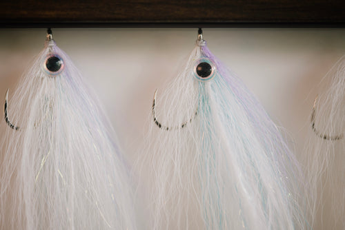 a closeup photo of a group of Pinfish flies tied by Josh Idol at Two Aught Fly Fishing Co