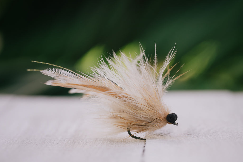 a closeup photo of the Run Around Sue tarpon fly tied by Josh Idol of Two Aught Fly Fishing Co