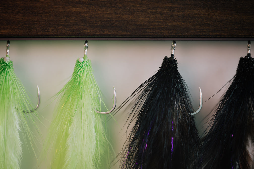 a group of the Snake tarpon flies tied by Josh Idol of Two Aught Fly Fishing Co
