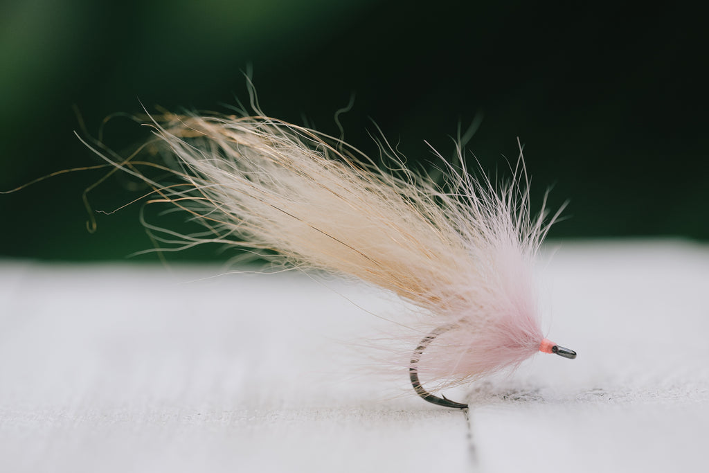 the Swamp Fox tarpon fly in tan & pink colorway tied by Josh Idol of Two Aught Fly Fishing Co