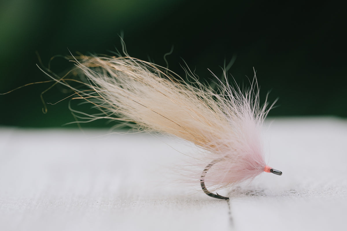 the Swamp Fox tarpon fly in tan & pink colorway tied by Josh Idol of Two Aught Fly Fishing Co