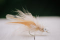the Tarpon Crab tarpon fly in tan colorway tied by Josh Idol of Two Aught Fly Fishing Co