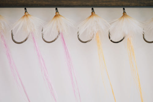 Worm tarpon flies hanging from my drying rack waiting to be shipped